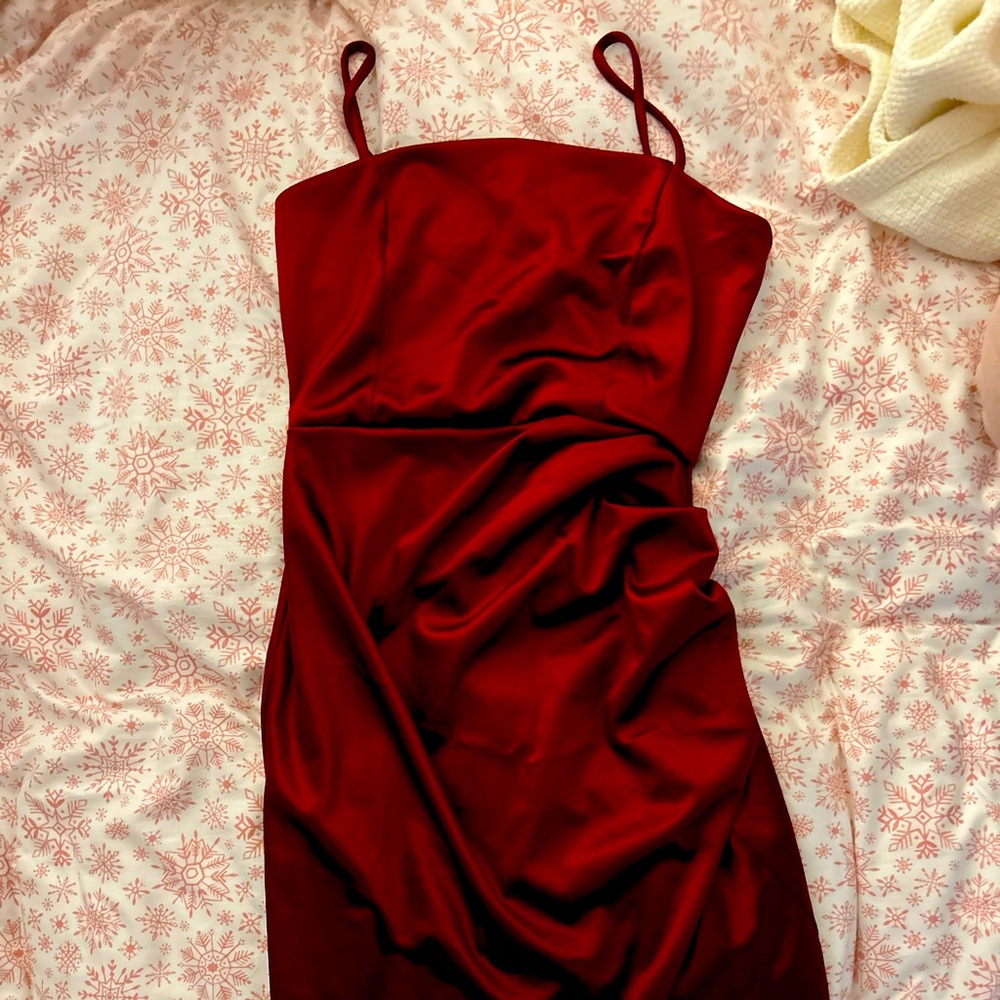 Dark red HOCO dress. Has a slit down the leg, dress is on the longer side.